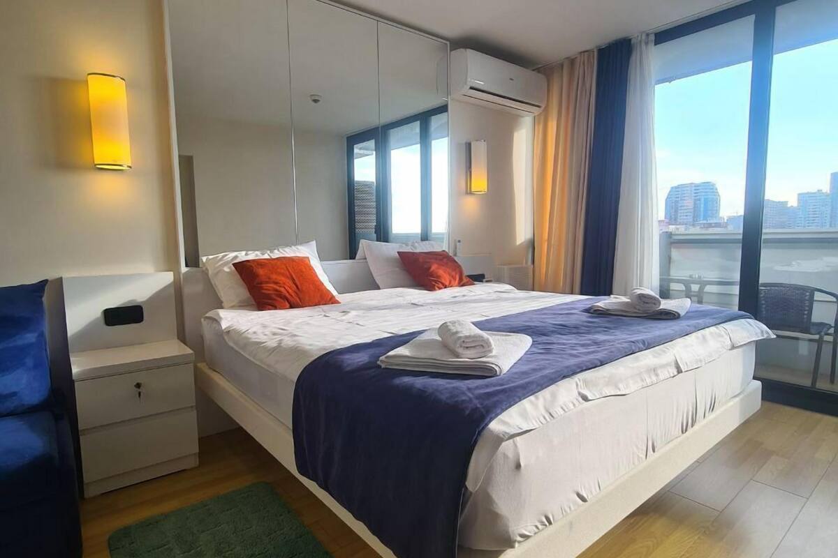 Chambre Familiale, non-fumeur, vue partielle sur la mer