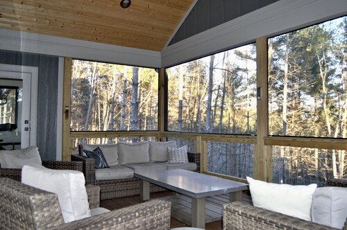 Lovely lakefront home with dock. Summertime stunner. Winter wonderland nearby.