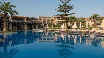 2 outdoor pools, open 10:00 AM to 6:00 PM, pool umbrellas, pool loungers