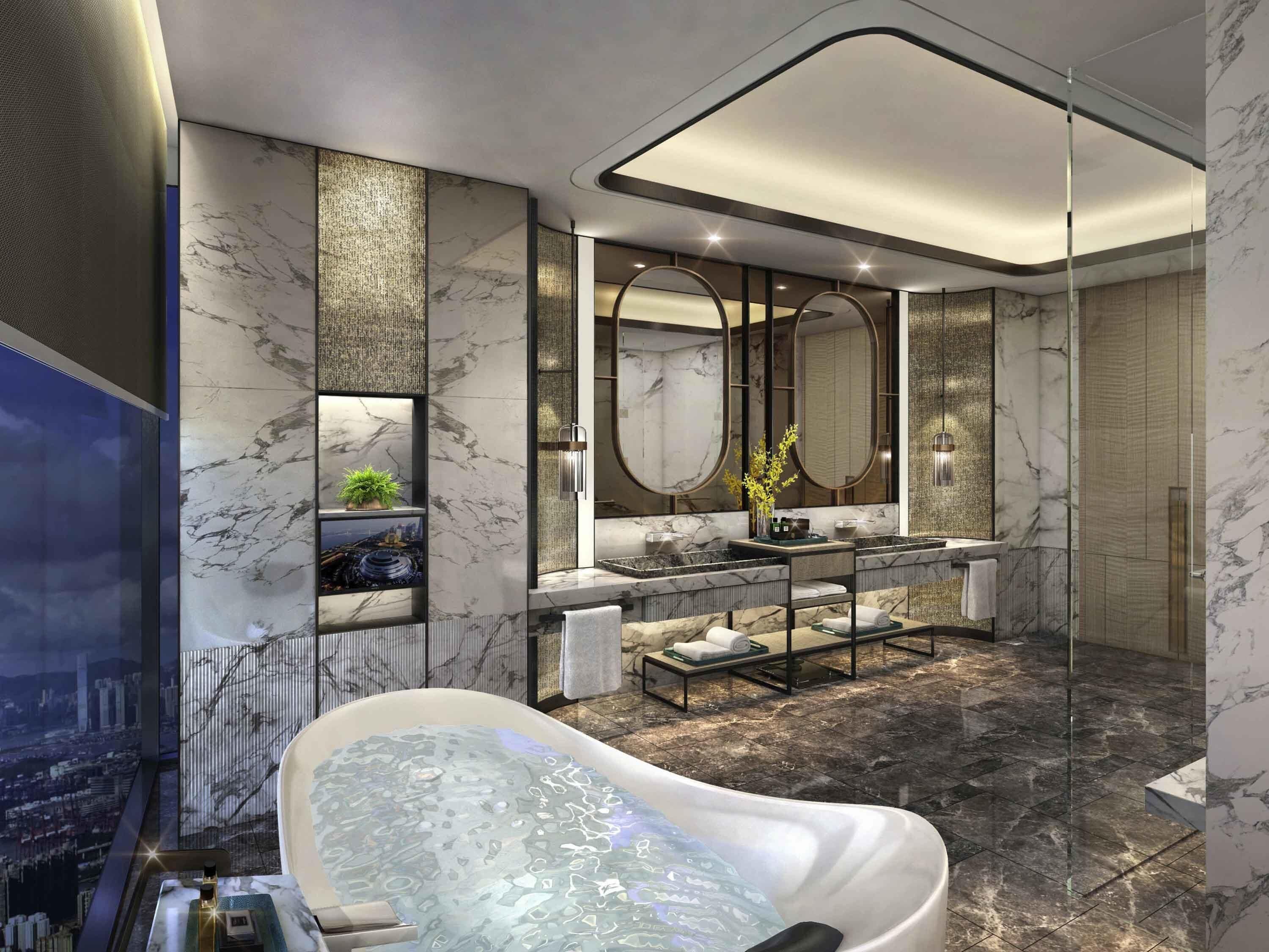 Edredones de plumas, minibar, caja fuerte y escritorio