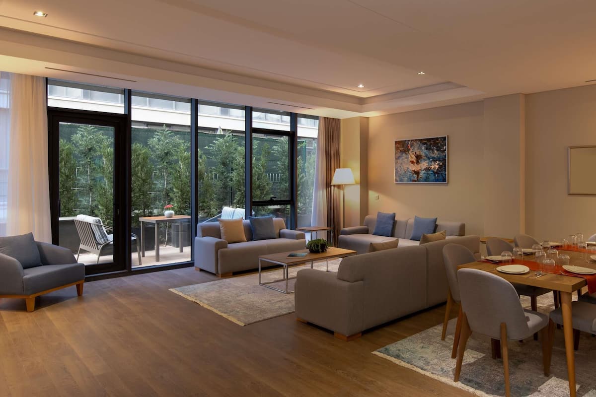 Deluxe Apartment, 4 Bedrooms (Garden) | In-room safe, desk, blackout drapes, iron/ironing board