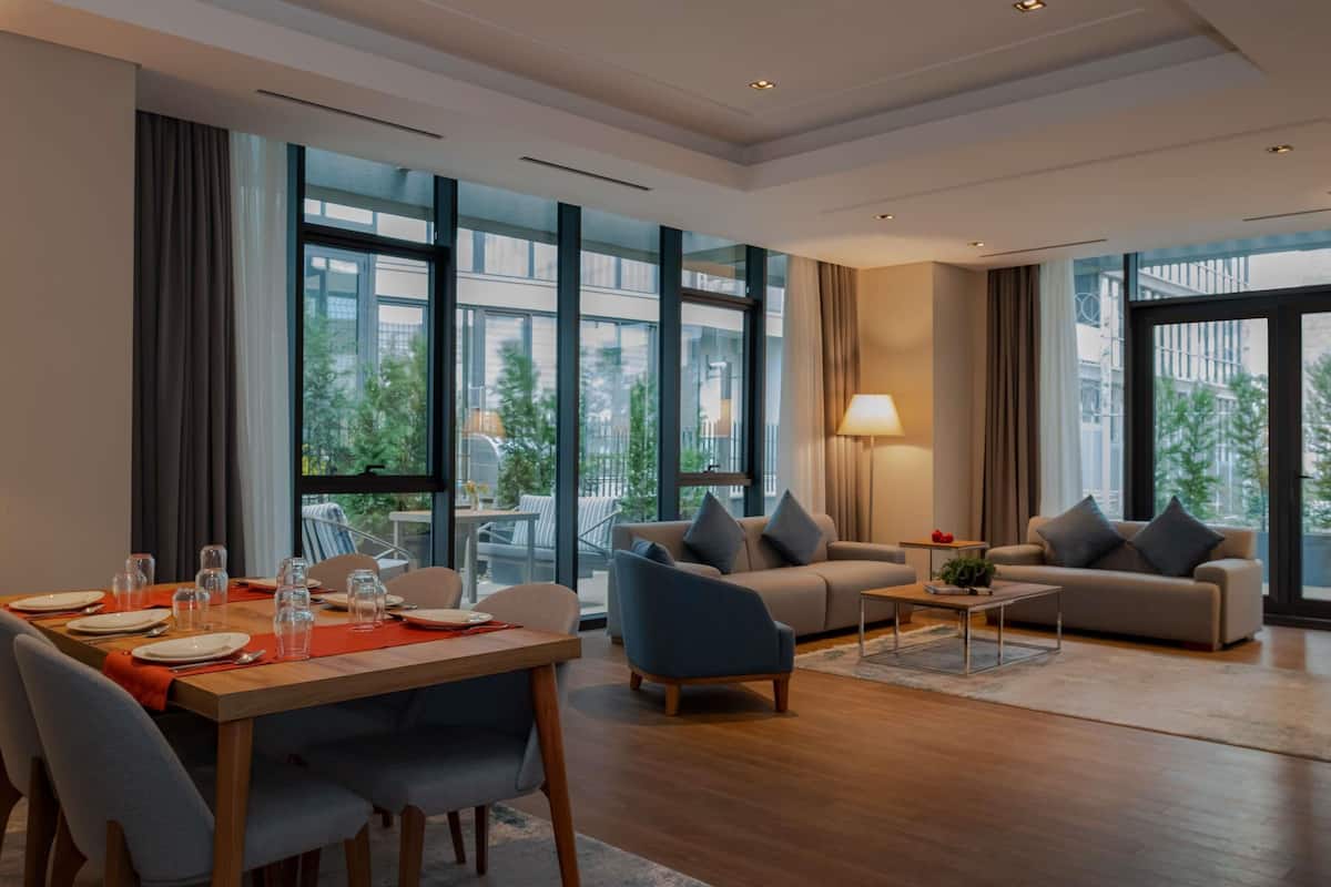 Deluxe Apartment, 3 Bedrooms (Garden) | In-room safe, desk, blackout drapes, iron/ironing board