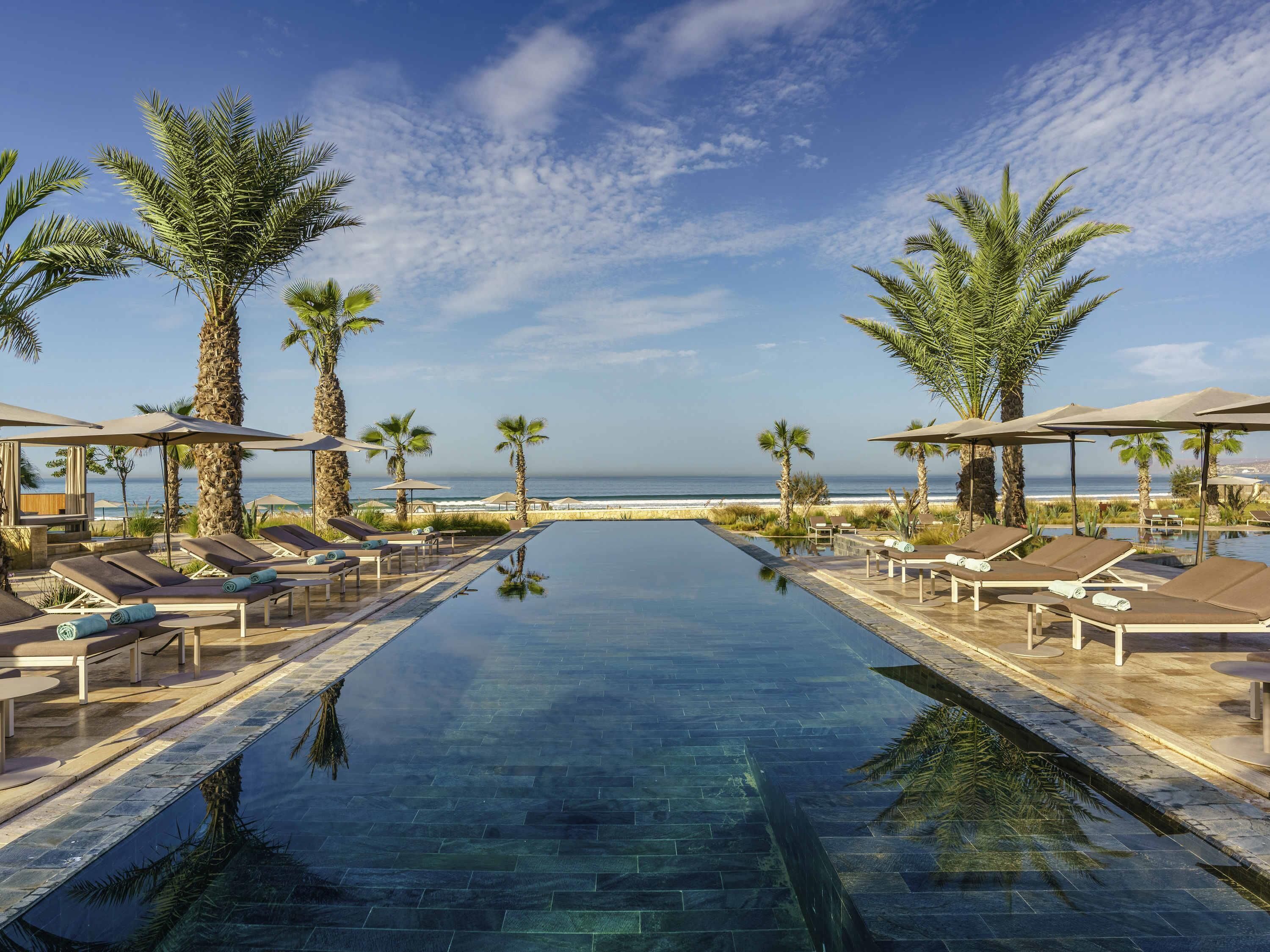 2 outdoor pools, open 8:00 AM to 8:00 PM, free cabanas, pool umbrellas