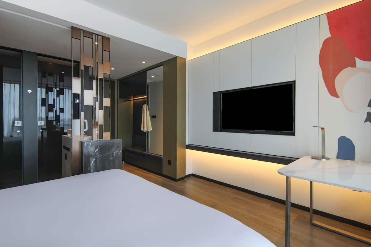 Colchones con pillow-top y minibar con artículos gratuitos
