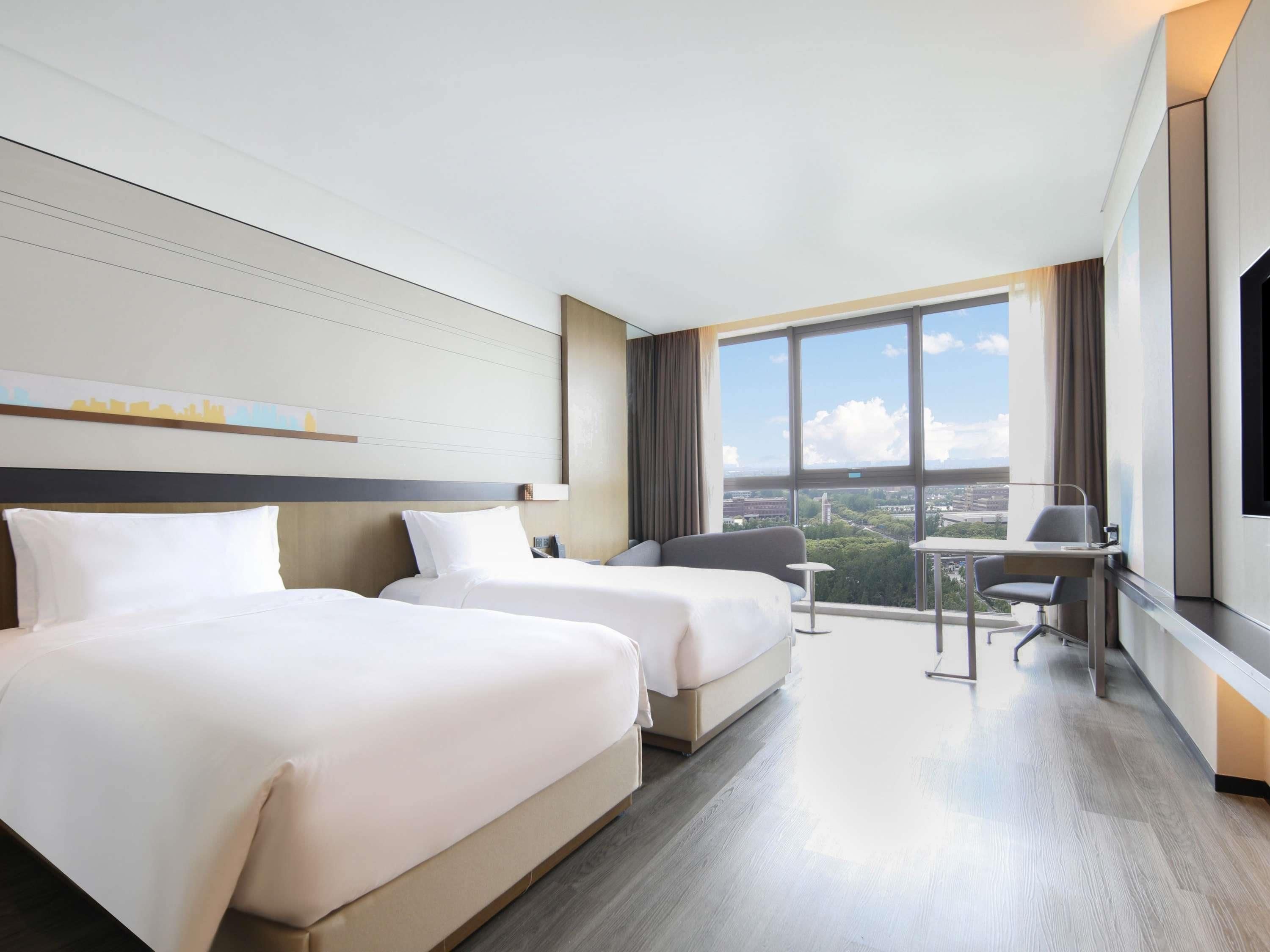 Quarto luxo, 2 camas de solteiro, vista para a cidade