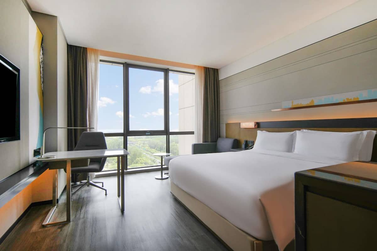 Premium bedding, pillow-top beds, free minibar, in-room safe