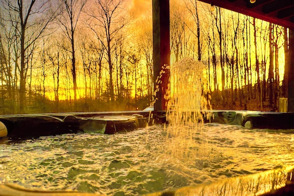 Sunrise in winter often brings bright colors, soak it in from a hot tub