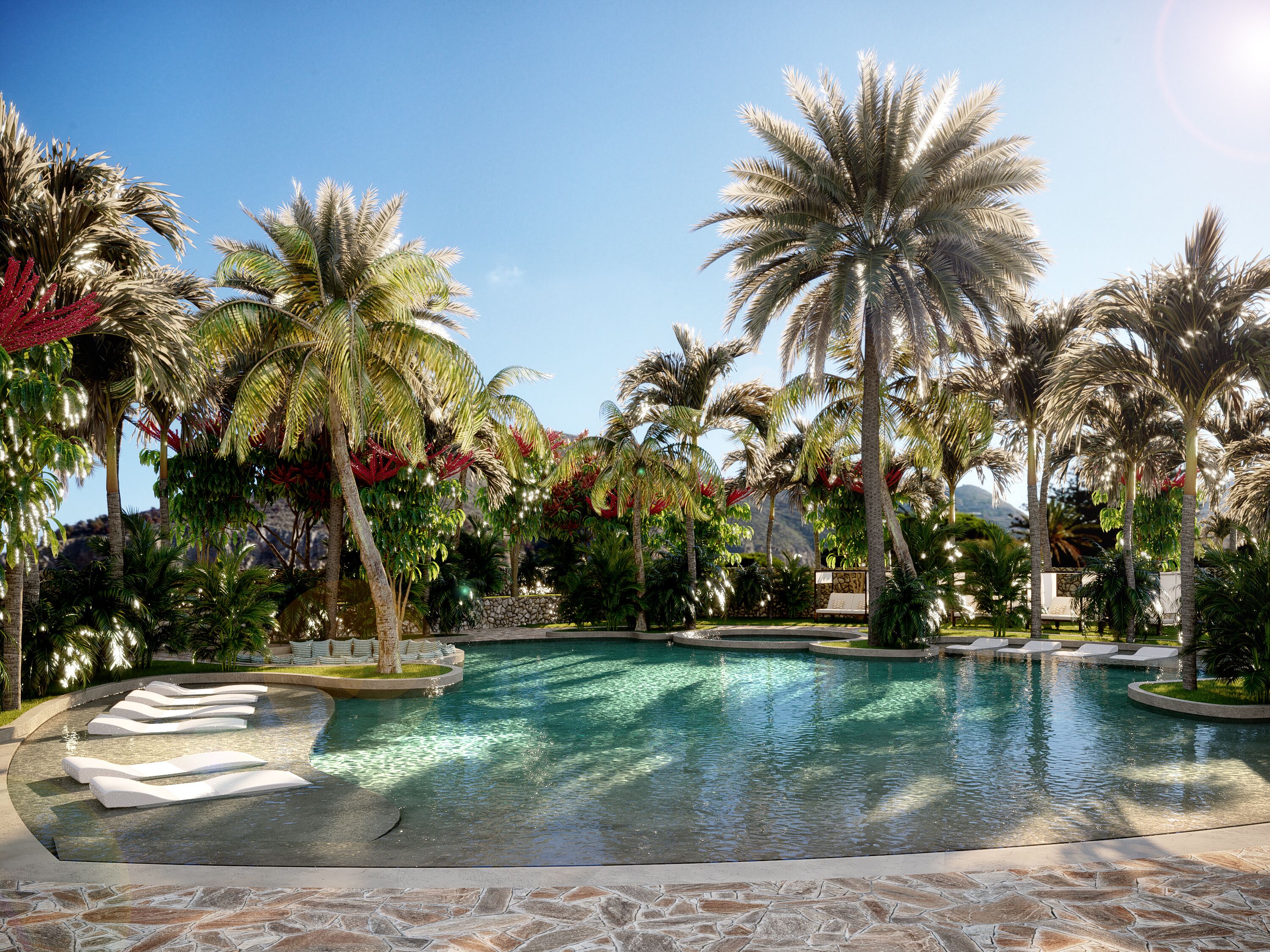 A pool area with palm trees, a stone pathway, and lounge chairs.