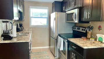 Fridge, microwave, coffee/tea maker, toaster