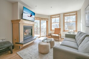 Design Condo, 1 Bedroom, Balcony, Courtyard View (Silver Mill 8225) | Living area | 42-inch flat-screen TV with cable channels, TV, fireplace