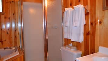 Shower, jetted tub, towels