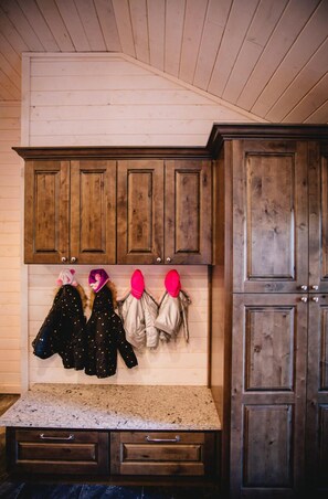 Kitchen area with cabinetry, countertop, and drawers.