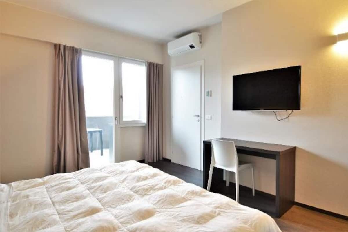 1 bedroom, desk, laptop workspace, blackout curtains