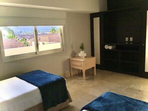 Departamento Deluxe, 2 habitaciones, vista al océano | 2 habitaciones y caja de seguridad en la habitación 