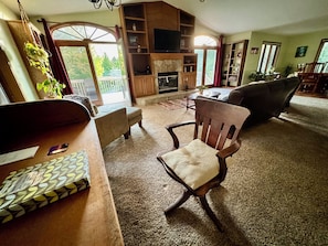 Smart TV, fireplace, table football, books