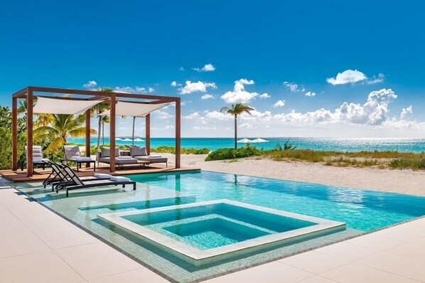 Piscine chauffée, chaises longues