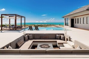 A heated pool, sun loungers