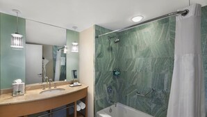 A modern bathroom with a double sink vanity, a bathtub, and a shower area. - Marenas Ocean View Apartment (Sunny Isles Beach)