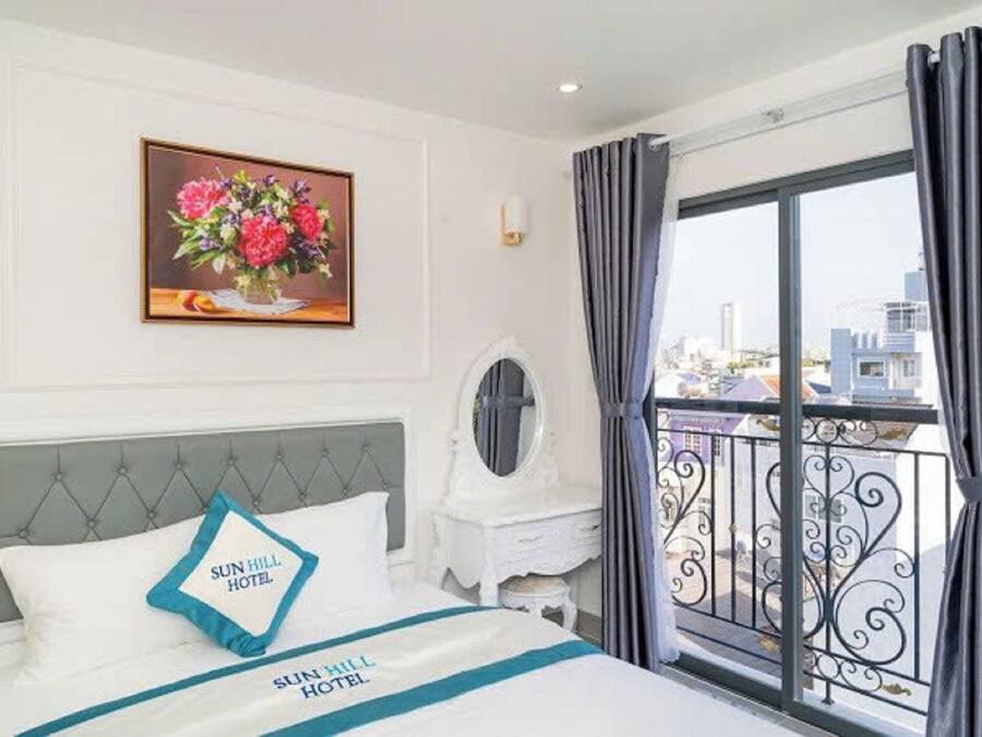 Deluxe Double Room with Balcony | Minibar, desk, laptop workspace, blackout curtains