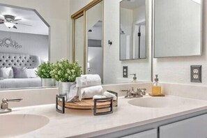 Bathtub, hair dryer, towels