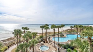 A resort with a pool, beach, and ocean view. - 🌞Beach Front-Corner Unit-Grand Panama 1-409🌞 (Panama City Beach)