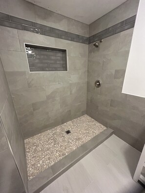 Combined shower/tub, hair dryer, towels, soap