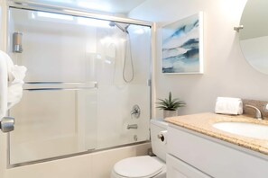 Bathtub, hair dryer, towels