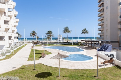 Amazing Apartment in front of the Beach with sunny terrace. - only families