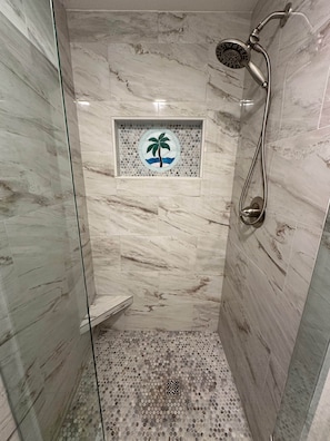 Combined shower/tub, hair dryer, towels, toilet paper