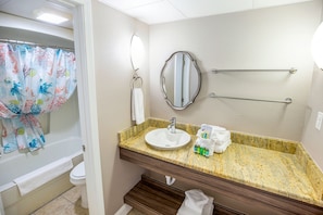 Combined shower/tub, hair dryer, towels, soap