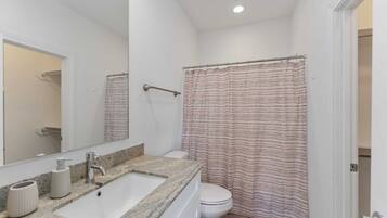 Jetted tub, hair dryer, towels, soap
