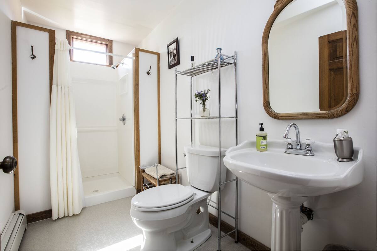 shower, designer toiletries, bathrobes, slippers