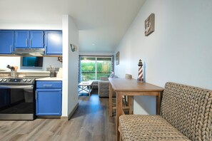 Condo | Living room | 50-inch flat-screen TV with cable channels, Smart TV, fireplace - Aurora at Nautilus (Ocean Shores)