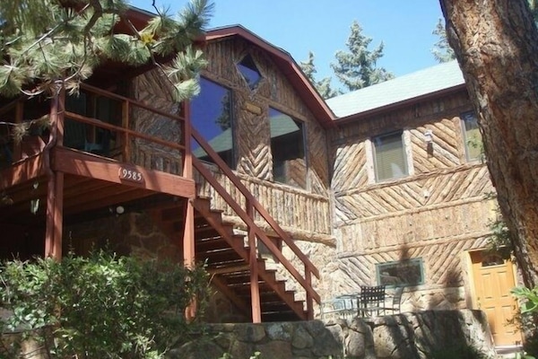 Front of the house with lots of windows to see the views of Ute Pass!