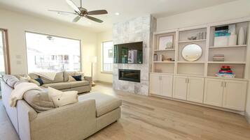 Smart TV, fireplace, books