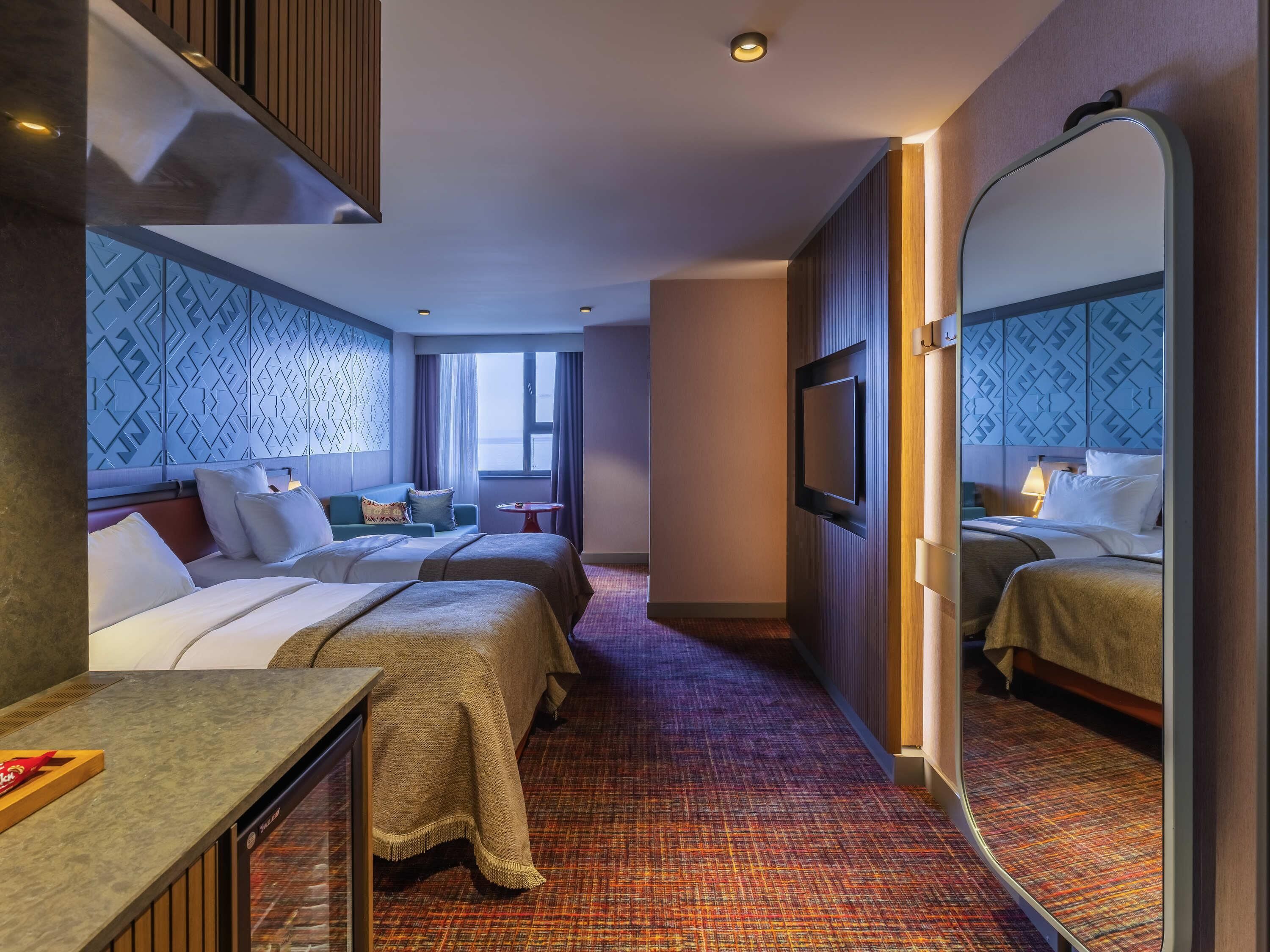 Minibar, bureau, chambres insonorisées, Wi-Fi gratuit