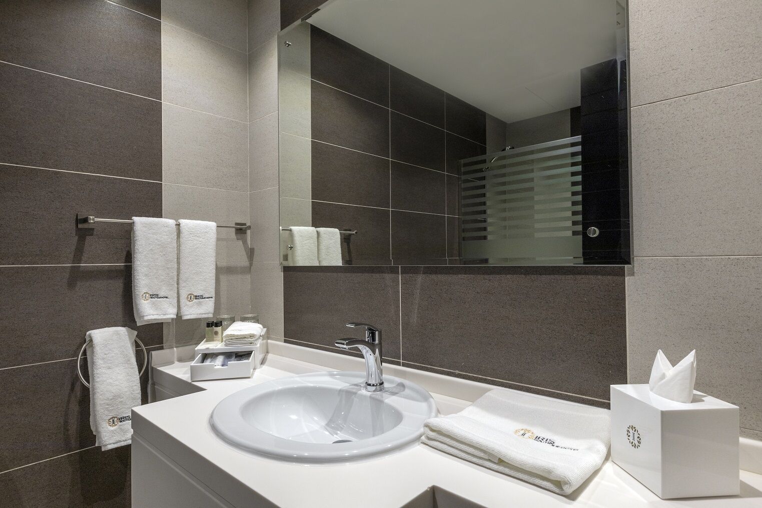 rainfall showerhead, designer toiletries, hair dryer, bathrobes