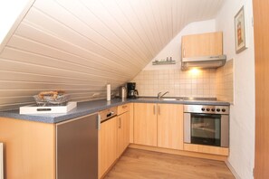 Réfrigérateur, four, plaque de cuisson, lave-vaisselle