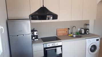 Réfrigérateur, four, plaque de cuisson, lave-vaisselle