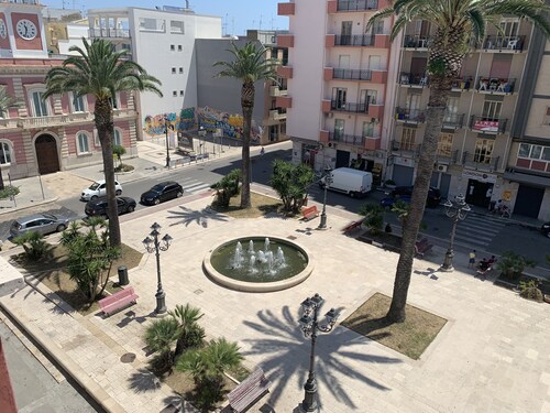 Penthouse in the town's pricipal square. Close to the sea to the spa to shopping