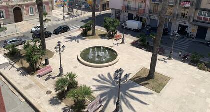 Penthouse in the town's pricipal square. Close to the sea to the spa to shopping