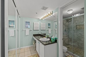 Combined shower/bathtub, hair dryer, towels, soap
