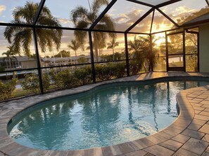 Outdoor pool, a heated pool - Waterfront house, boat dock, pool, walking distance to Port Charlotte Beach (Port Charlotte)