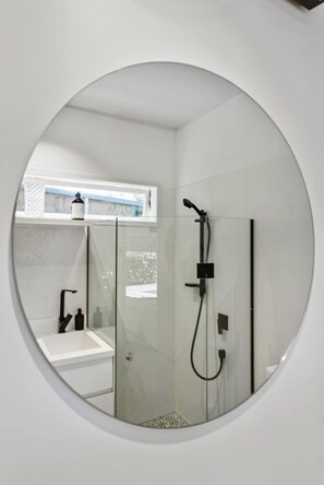 Shower, towels, soap, toilet paper