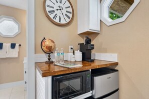 Fridge, microwave, coffee/tea maker, paper towels