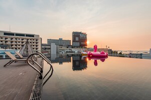 Outdoor pool, open 9:00 AM to 7:00 PM, sun loungers