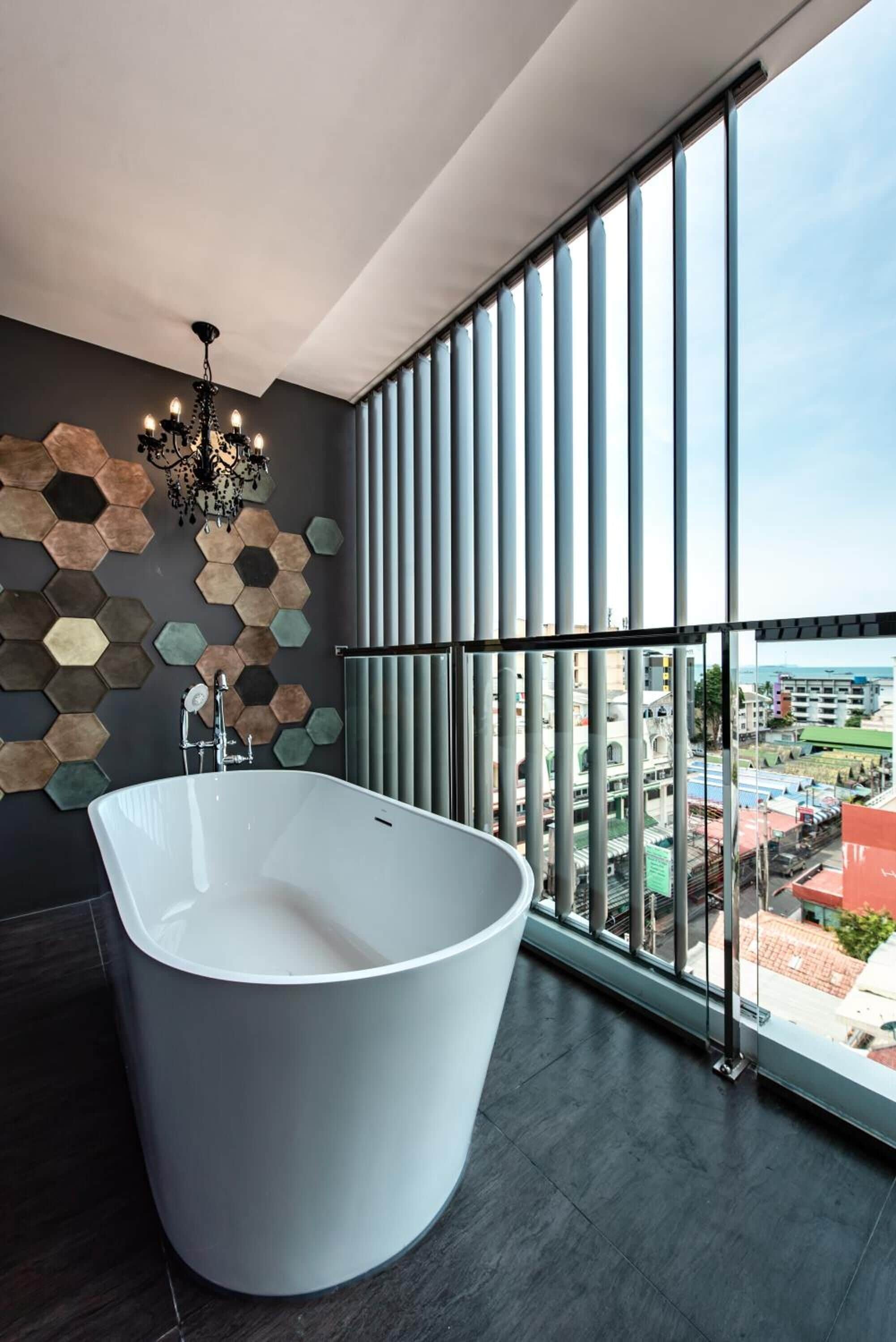 separate bathtub and shower, free toiletries, hair dryer, bathrobes