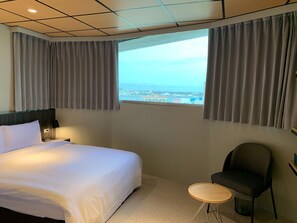 Down duvets, blackout curtains, free WiFi, bed sheets - ZZ Inn (Magong)