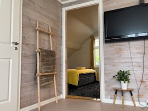 Apartment, 3 Bedrooms, Smoking, Balcony | Living room | Flat-screen TV