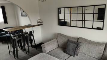 Apartment, 1 Bedroom | Living area | Books